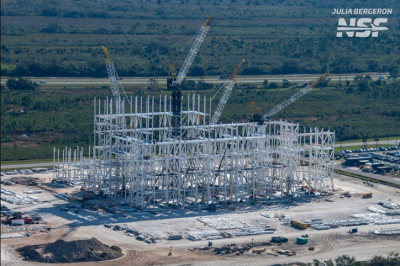 Гигантское сооружение на фото: в Gigabay планируют собирать тысячу Starship в год